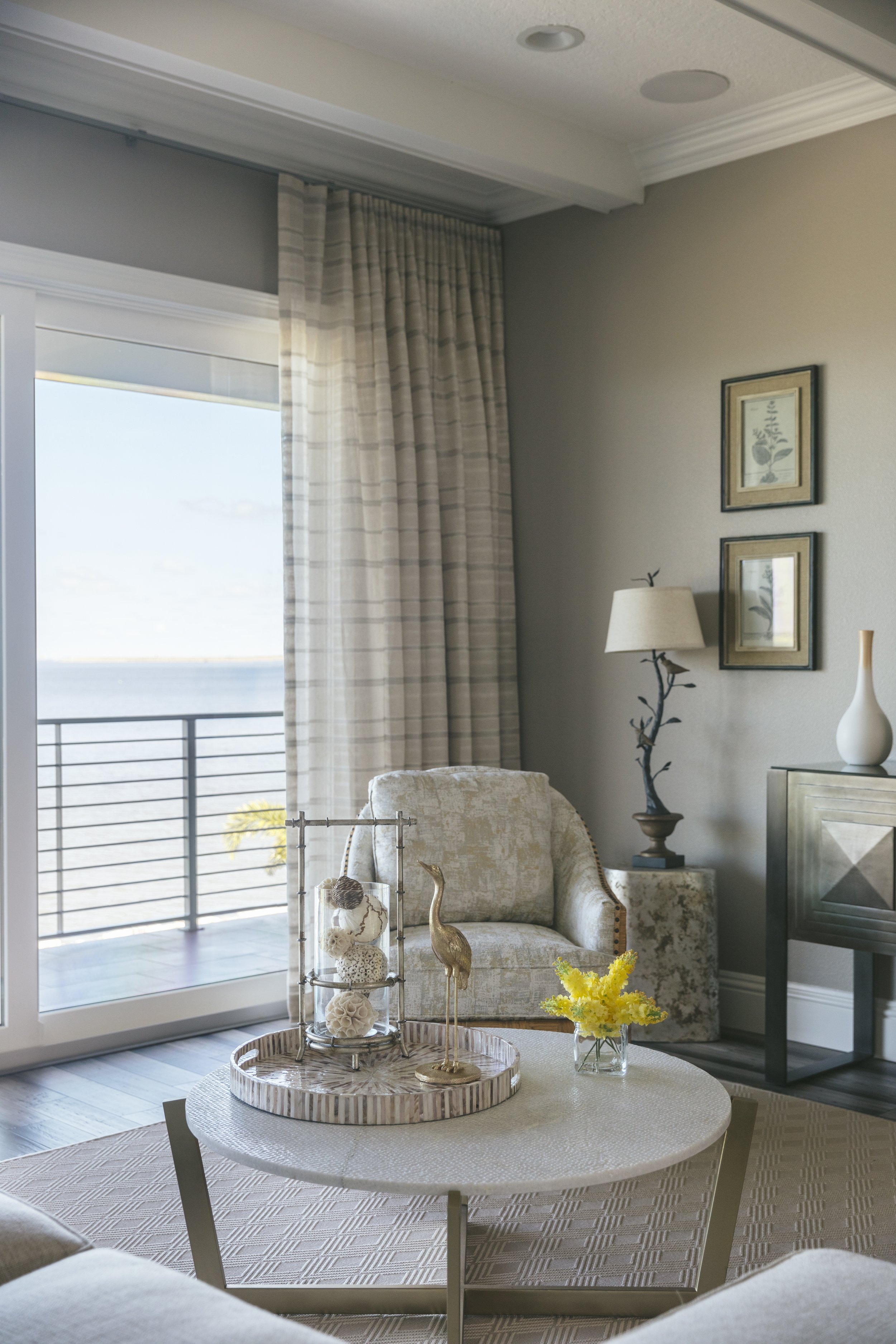 living room views of the beach and beautiful interiors that complement the tones of the sand