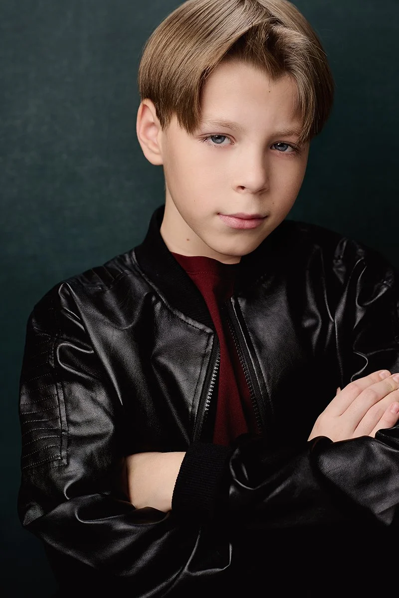Commercial acting headshot of a young boy photographed in Orlando, Florida