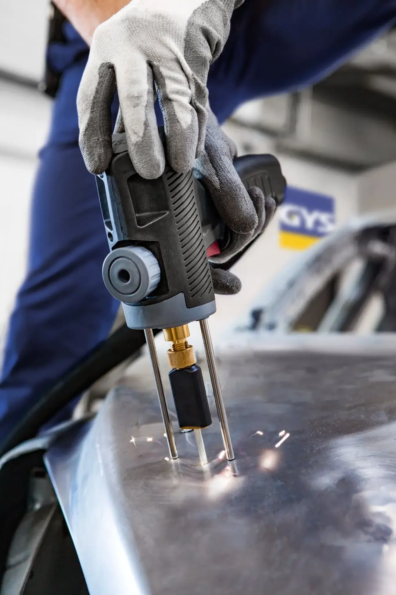Man using a GYS dent puller
