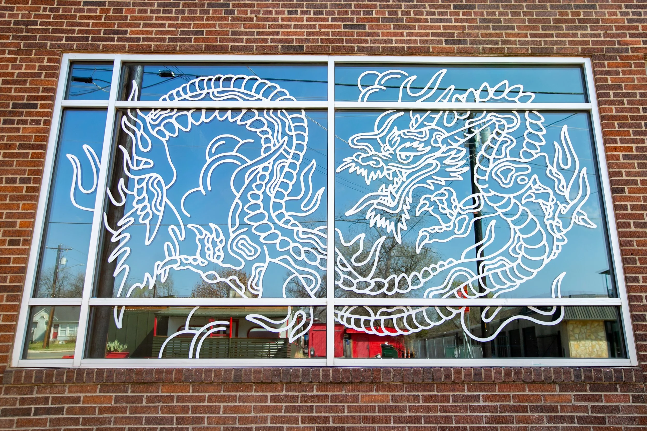 Trilogy Tattoo Studio Windows