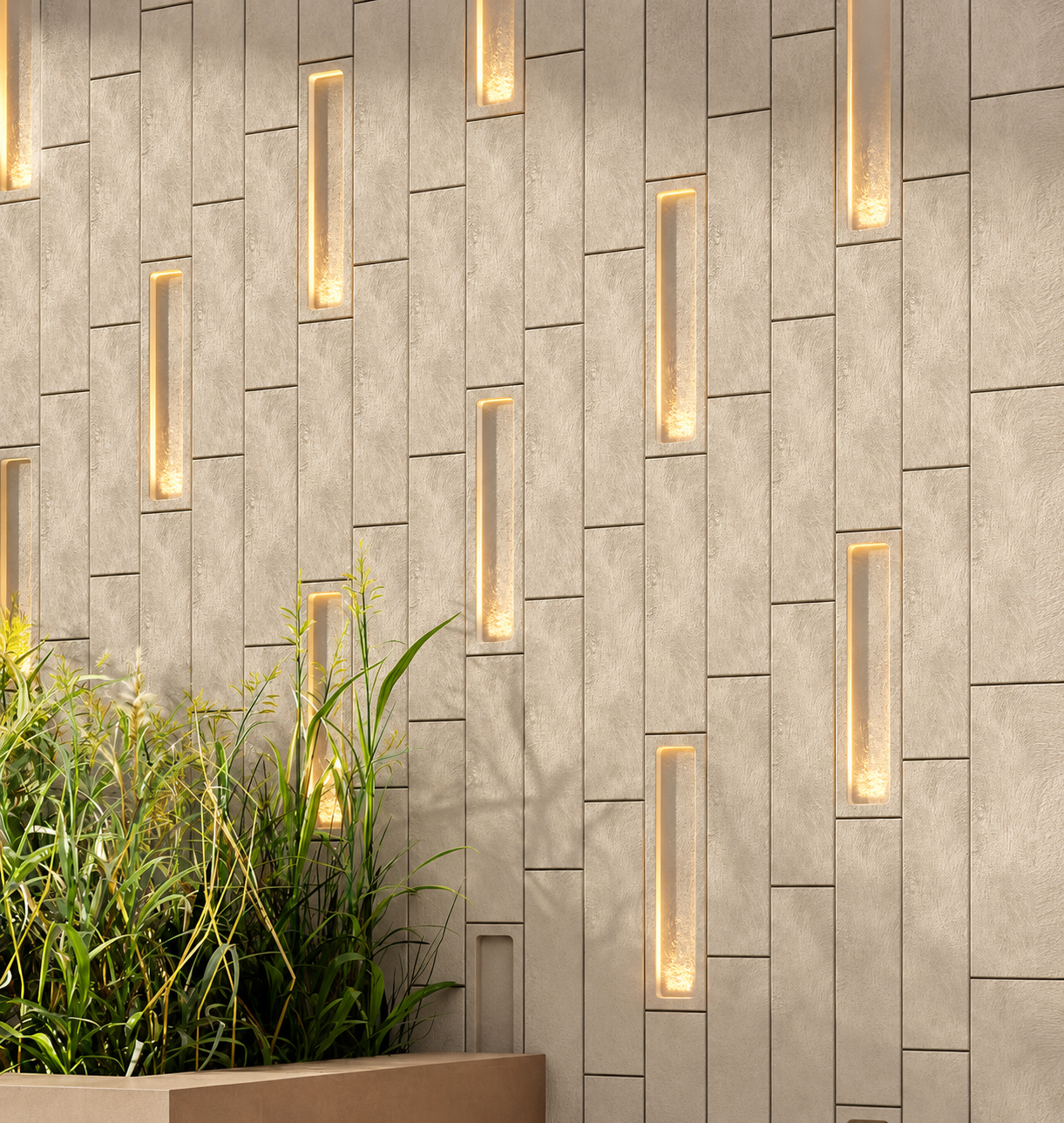 Interior wall with beige tiles and vertical light fixtures, and a large potted plant with tall green leaves in the foreground.