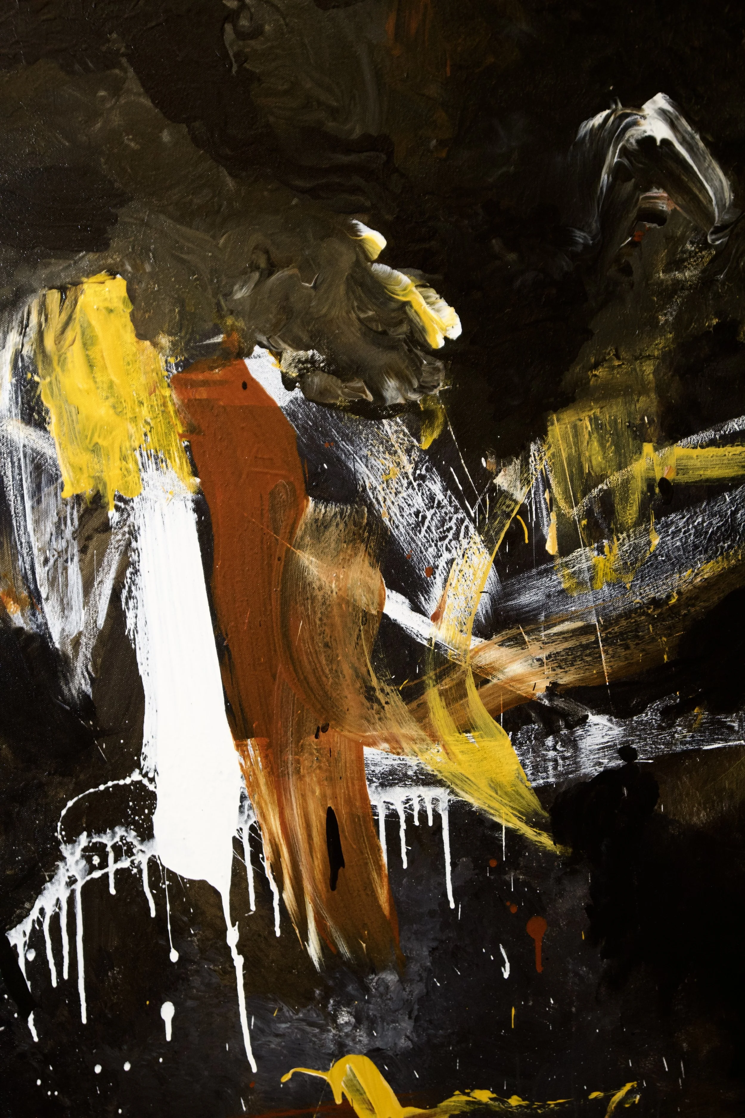 An abstract painting with prominent black, white, yellow, and orange brushstrokes and splatters.