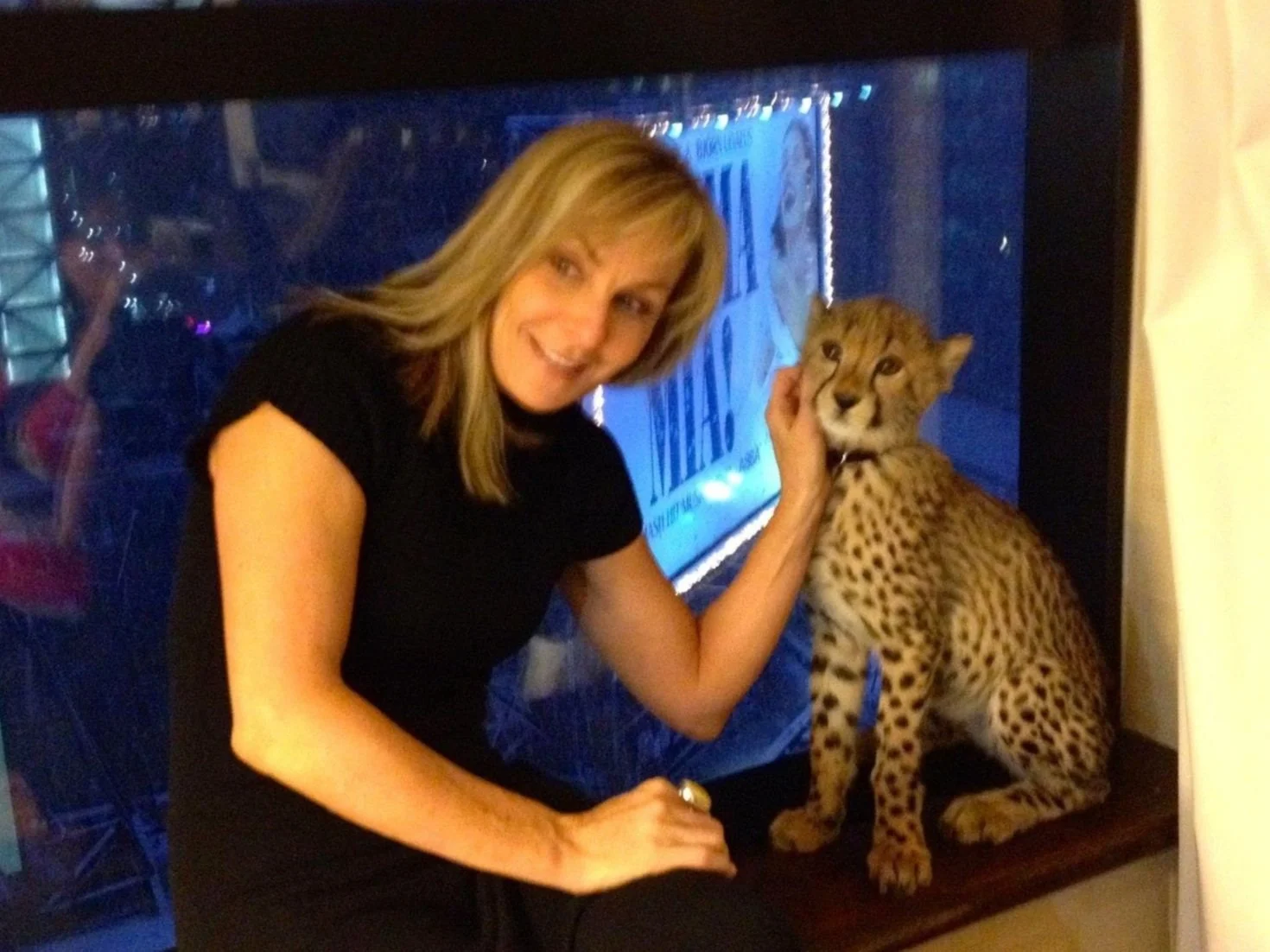Judy above the bright lights of Broadway with Savannah from the Cinncinati Zoo