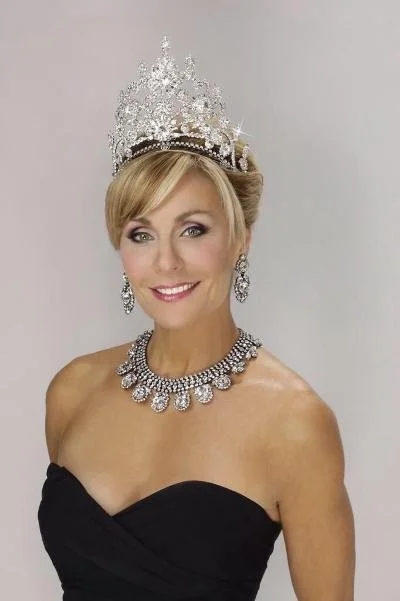 Judy modeling for a Moans Couture photo shoot, jewelry by Farrah Moans