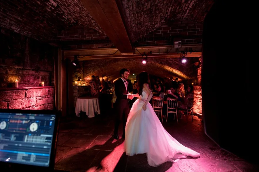 Couple dancing by candlelight at the Rowantree at the Caves Edinburgh