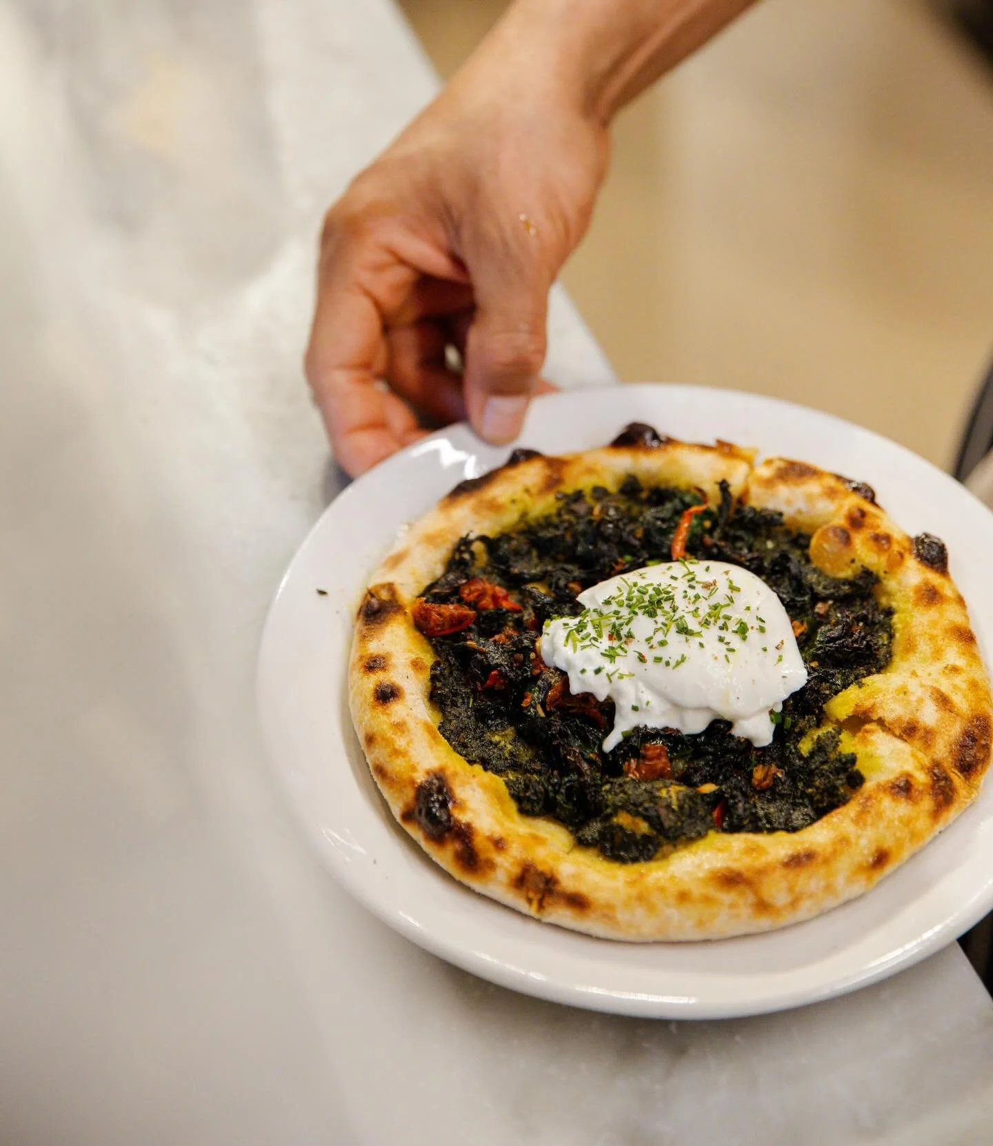 Already thinking of lunch? Us too&hellip; 💭

If you&rsquo;re on the hunt for a delicious midday reset, we&rsquo;ve got you covered 

Our cavolo nero flatbread - topped with burrata, roasted garlic, sun-dried tomato and chilli&hellip; 🌶️ 

Add a sea