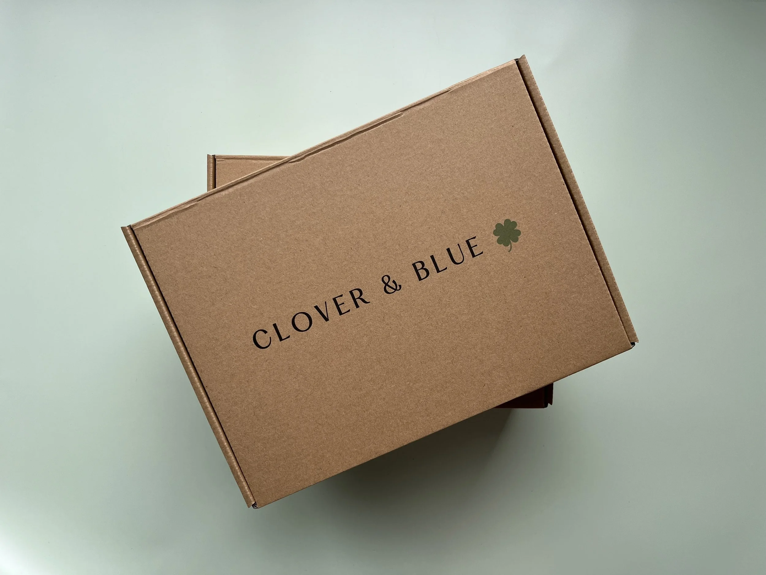 Clover & Blue packaging - Company logo displayed on package box