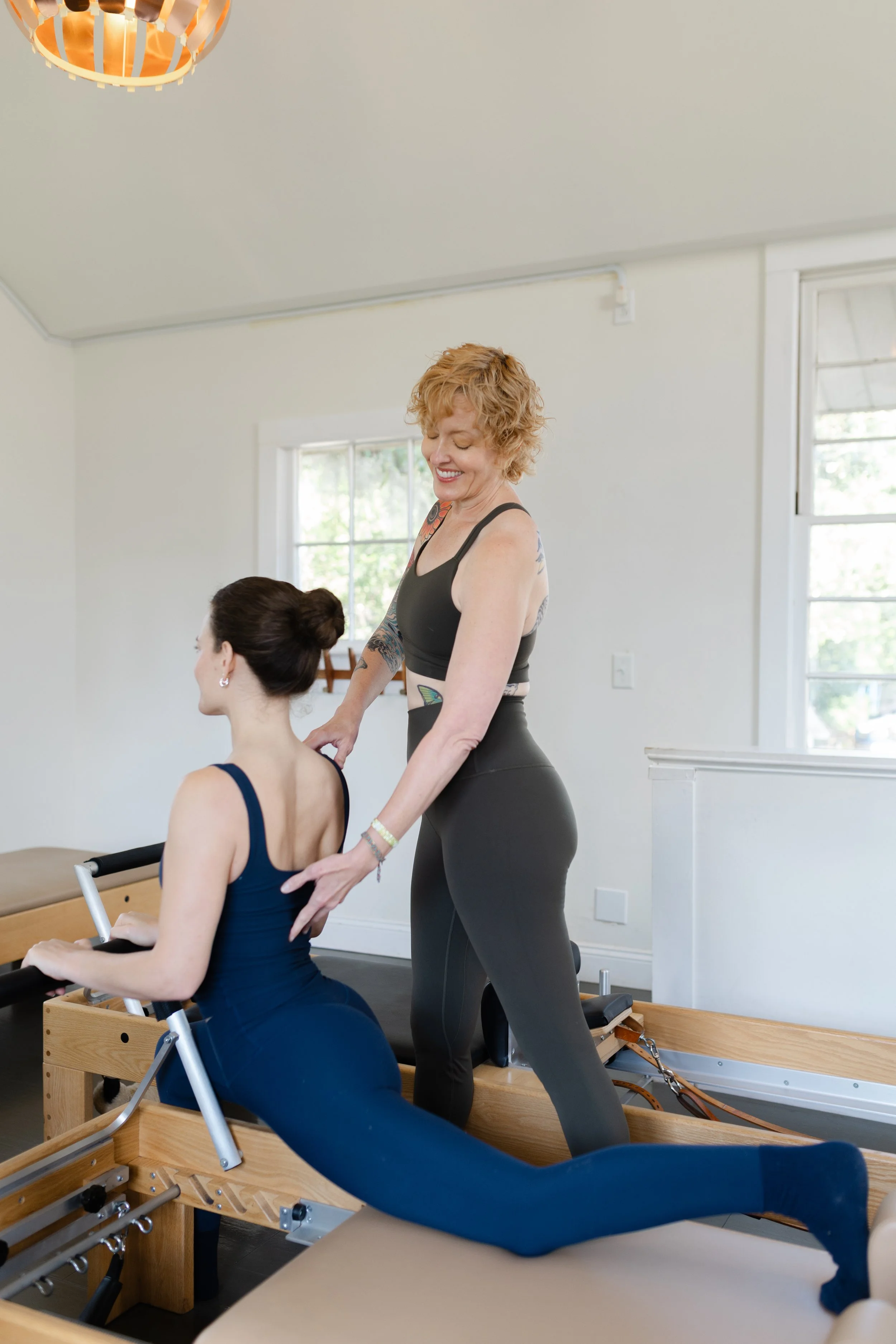 Pilates instructor Jennifer Walker in her Avondale studio Pilates by Jen in Jacksonville, Florida during a private session