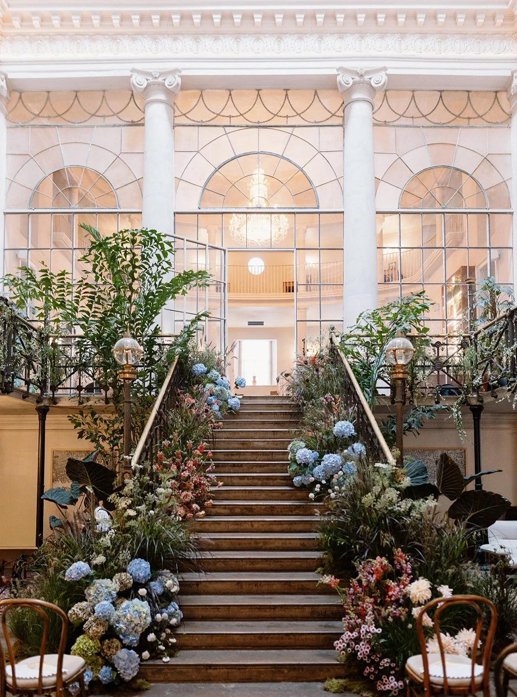 FLORAL FOCUS 

A Monday moment of appreciation for this floral staircase of dreams. Colourful, wild, and undulating, it was the key focal point for H&amp;S's wedding at Old Sessions House, meticulously composed by @lovergirl.weddings 
Thank you to @r