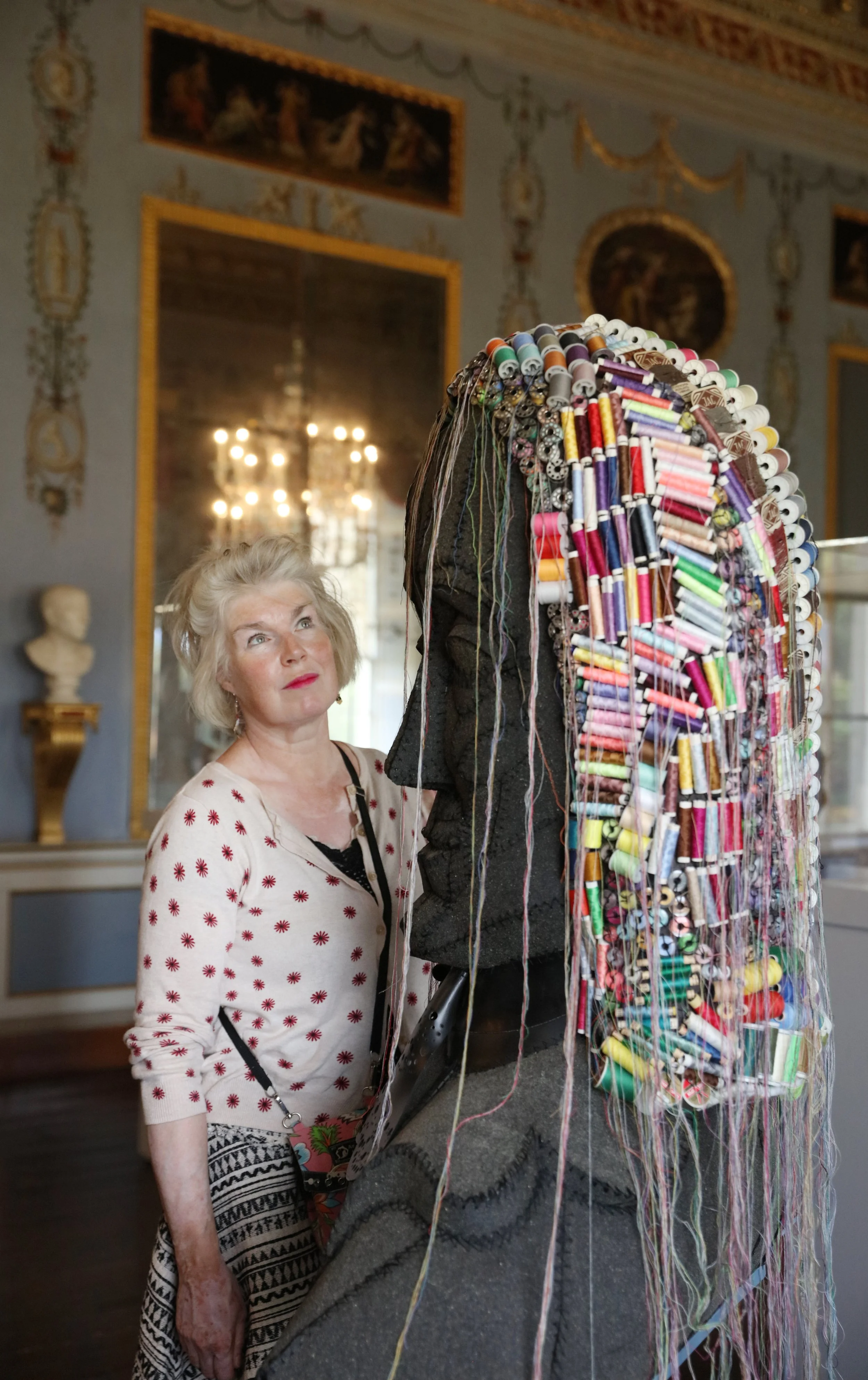Evelyn Van Duyl with her sculpture "Voltaire"