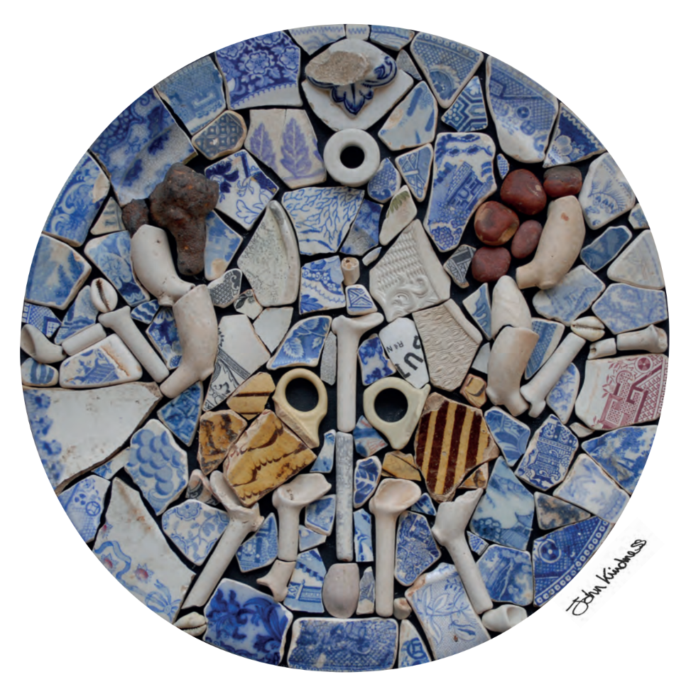 John Kindness "The work is based on the Winged Fauns relief on a pedestal at the Casino. The materials come from the Thames at low tide. Basically a plate of broken plates. In parts of England these are called ‘Booty plates’ and are a vernacular art 