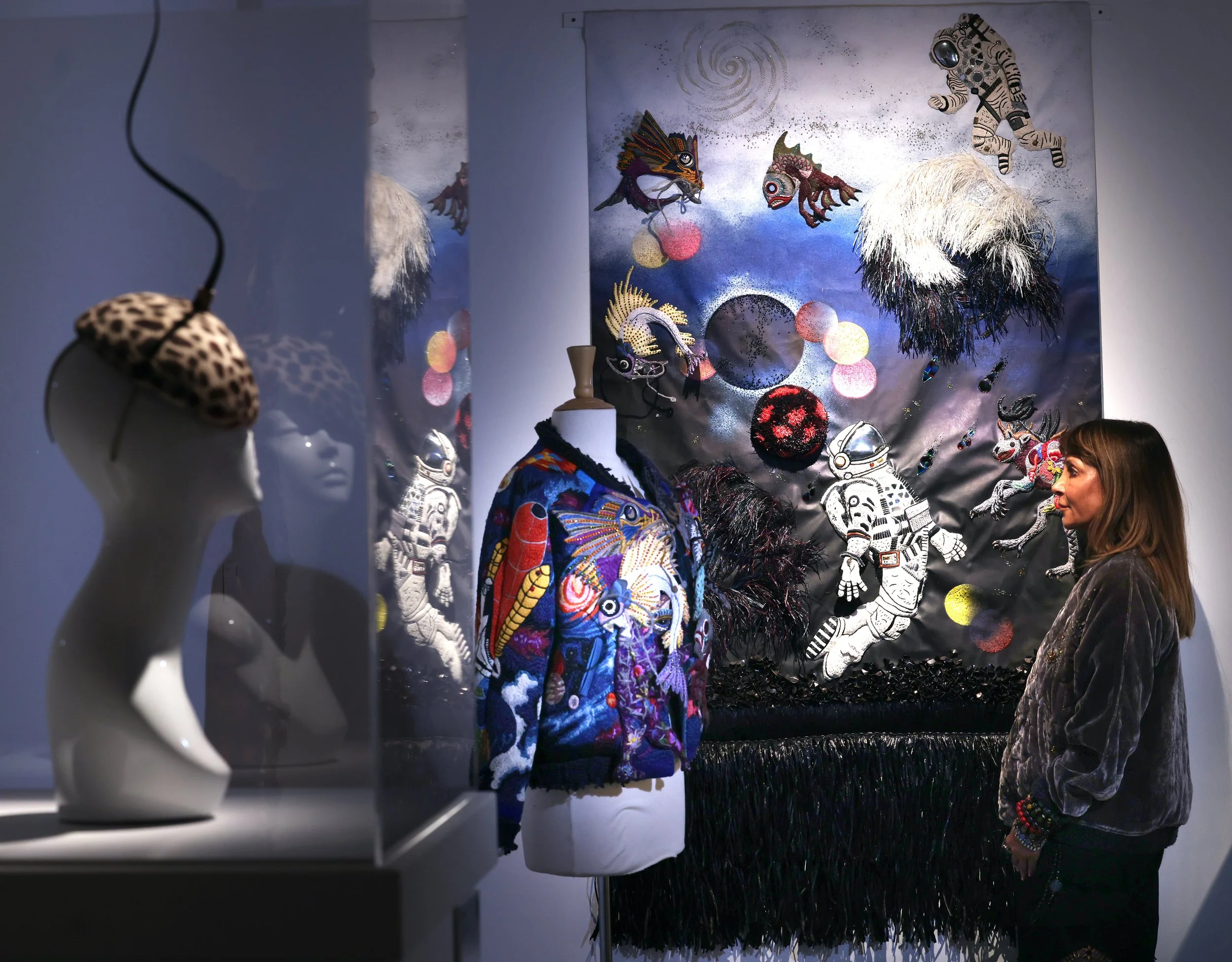 Hat by Philip Treacy, Embroidered raffia bomber jacket and panel by Sanchita Ajjampur
