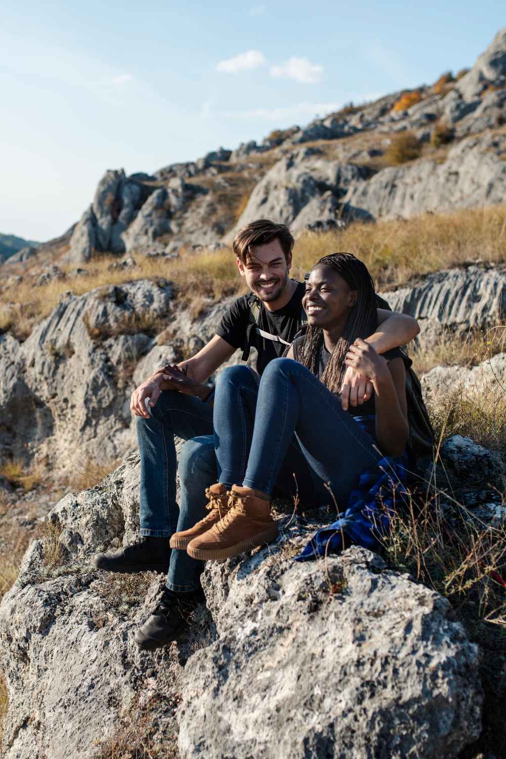 (Stay Healthy) Alt_ Couple sitting during outdoor hike.png