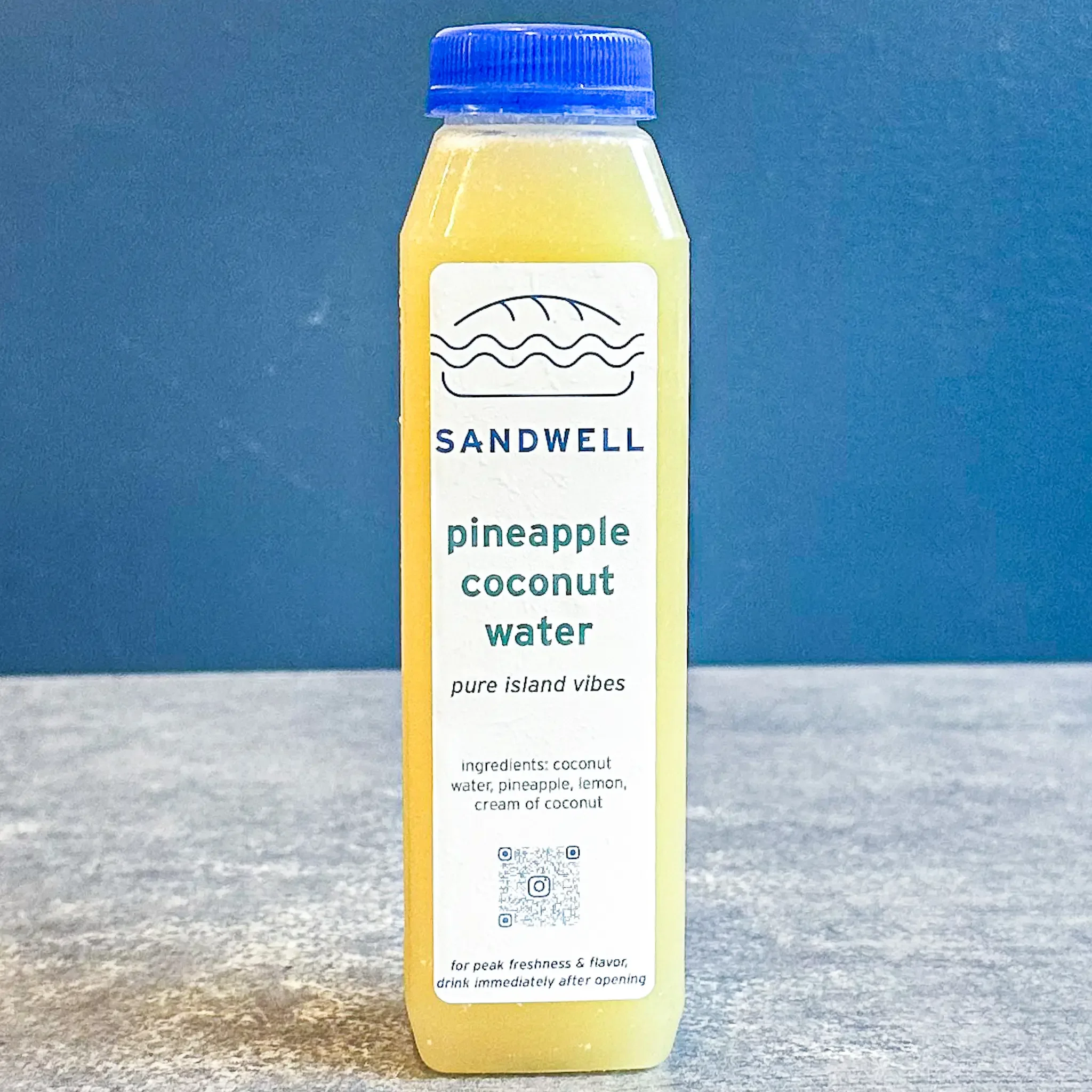 Sandwell's Pineapple Coconut Water — made with coconut water, pineapple, lemon, and cream of coconut, available at Sandwell sandwich shops in NYC