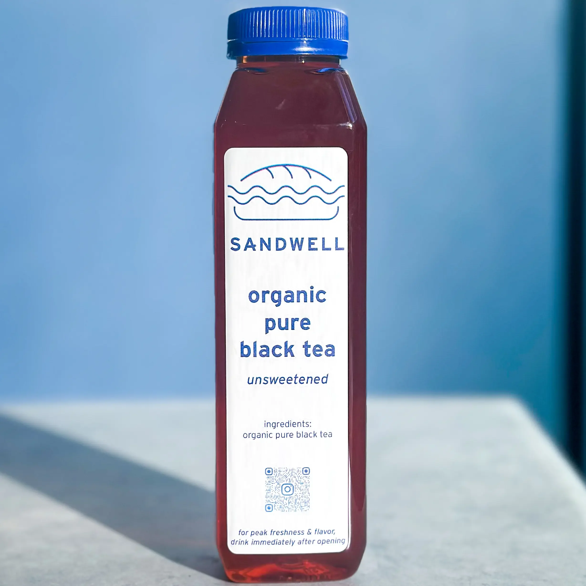 Sandwell's Organic Pure Black Tea — an unsweetened organic black tea blend brewed fresh daily, available at Sandwell sandwich shops in NYC