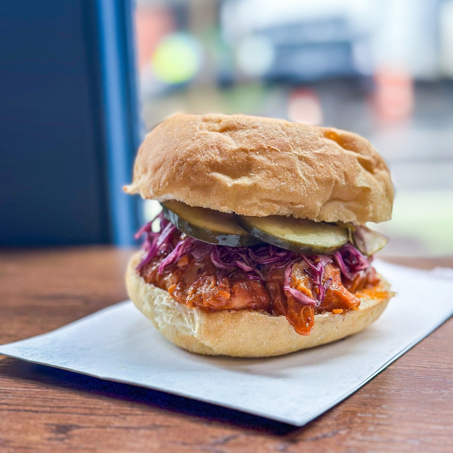🚨 new 🔥 special alert 🚨 introducing the Ros&eacute; BBQ Chicken Sandwich, just in time for picnic season. featuring pickle-brined pulled chicken, tangy ros&eacute; bbq sauce, red cabbage slaw &amp; dill pickle slices on our house-made fresh kaiser