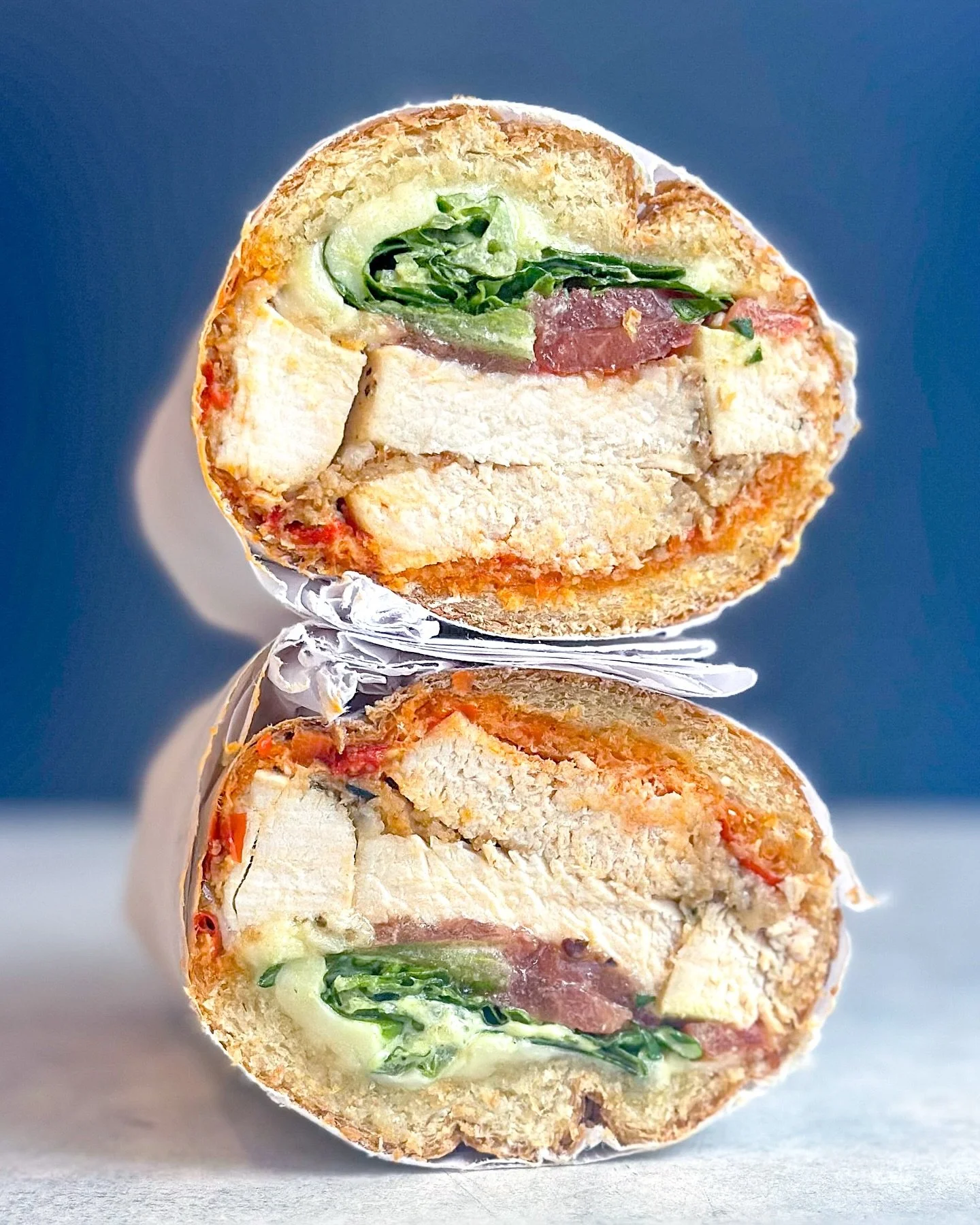 say 👋 to the Calabrian Hot Honey Chicken limited-time special, layered with calabrian hots, baked chicken cutlet, house-infused hot honey, provolone, basil mayo, lettuce &amp; tomato. a lil 🌶️, a lil 🍯, all made fresh to order on our own fresh-bak