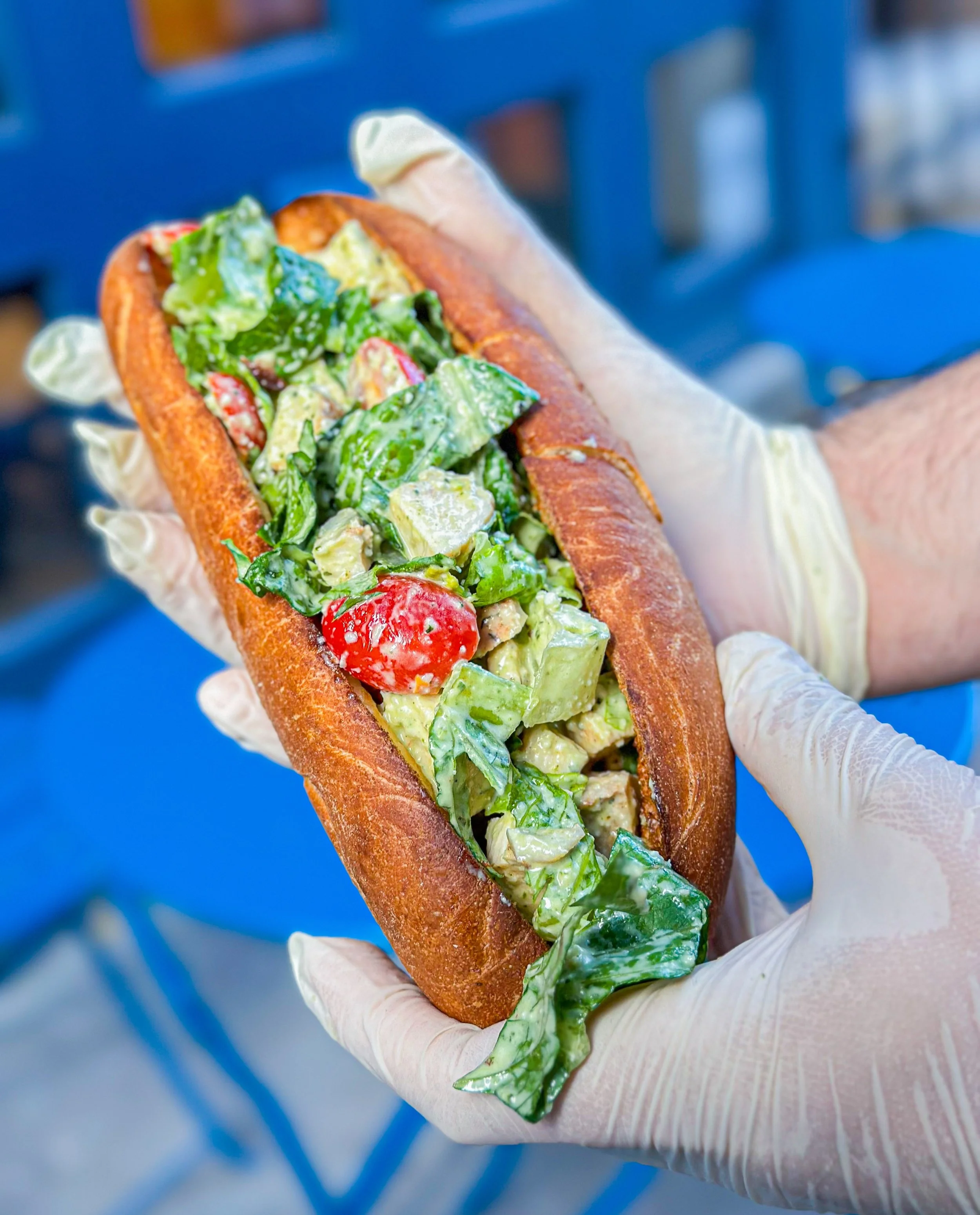 Say hello to our little friend - the Green Goddess Chicken Caesar Sub. We couldn&rsquo;t decide whether green goddess or caesar was the GOAT dressing, so we went with both. Provolone gets toasted into our house-baked semolina bread - like one big che