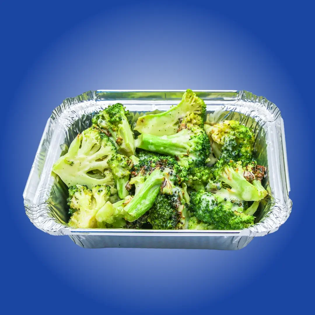 Sandwell's Roasted Broccoli side with vegan avocado ranch and zesty toasted breadcrumbs, available at Sandwell sandwich shops in NYC