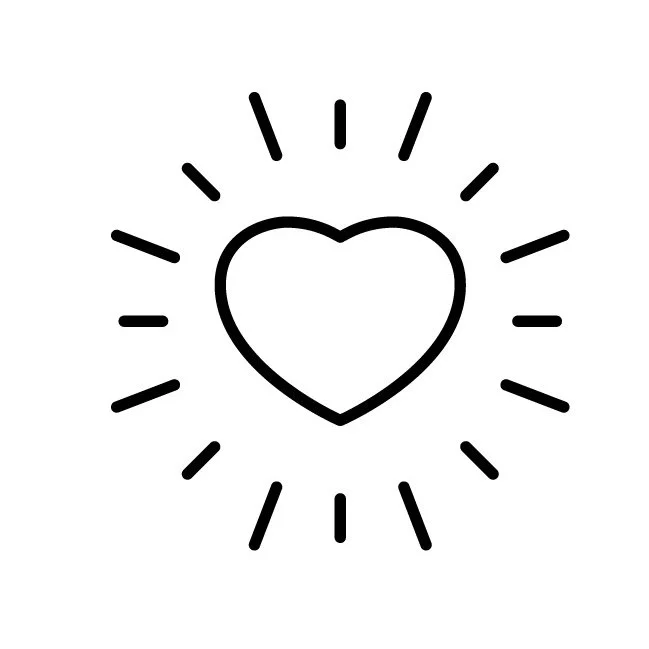 Black outline heart with radiating lines suggesting shine or light around it on a white background.