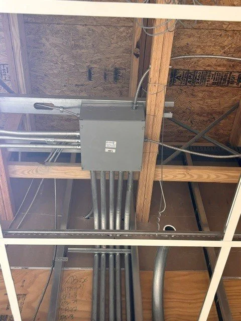Junction box with conduit runs