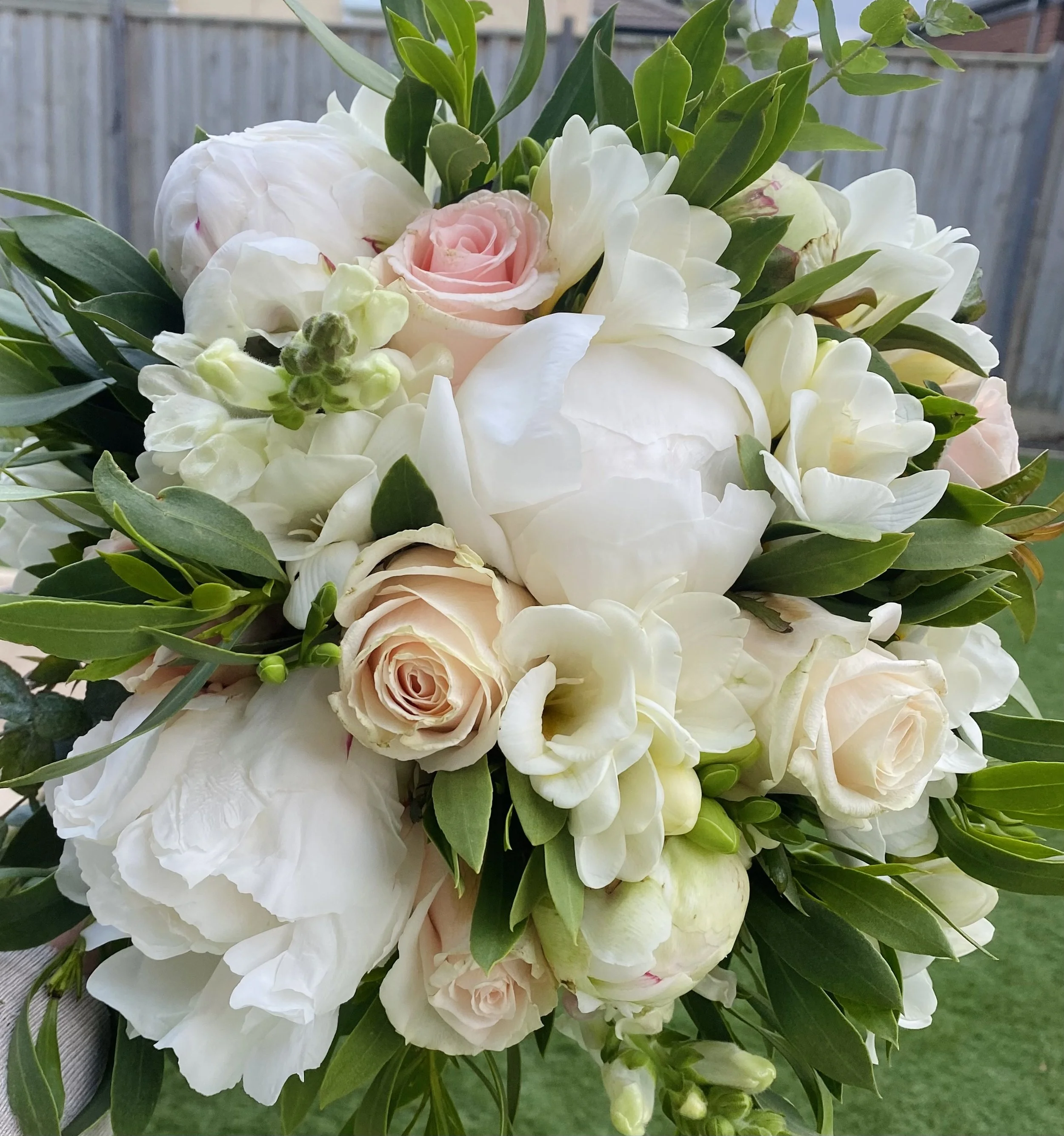 Peony white rose and blush bridal bouquet.