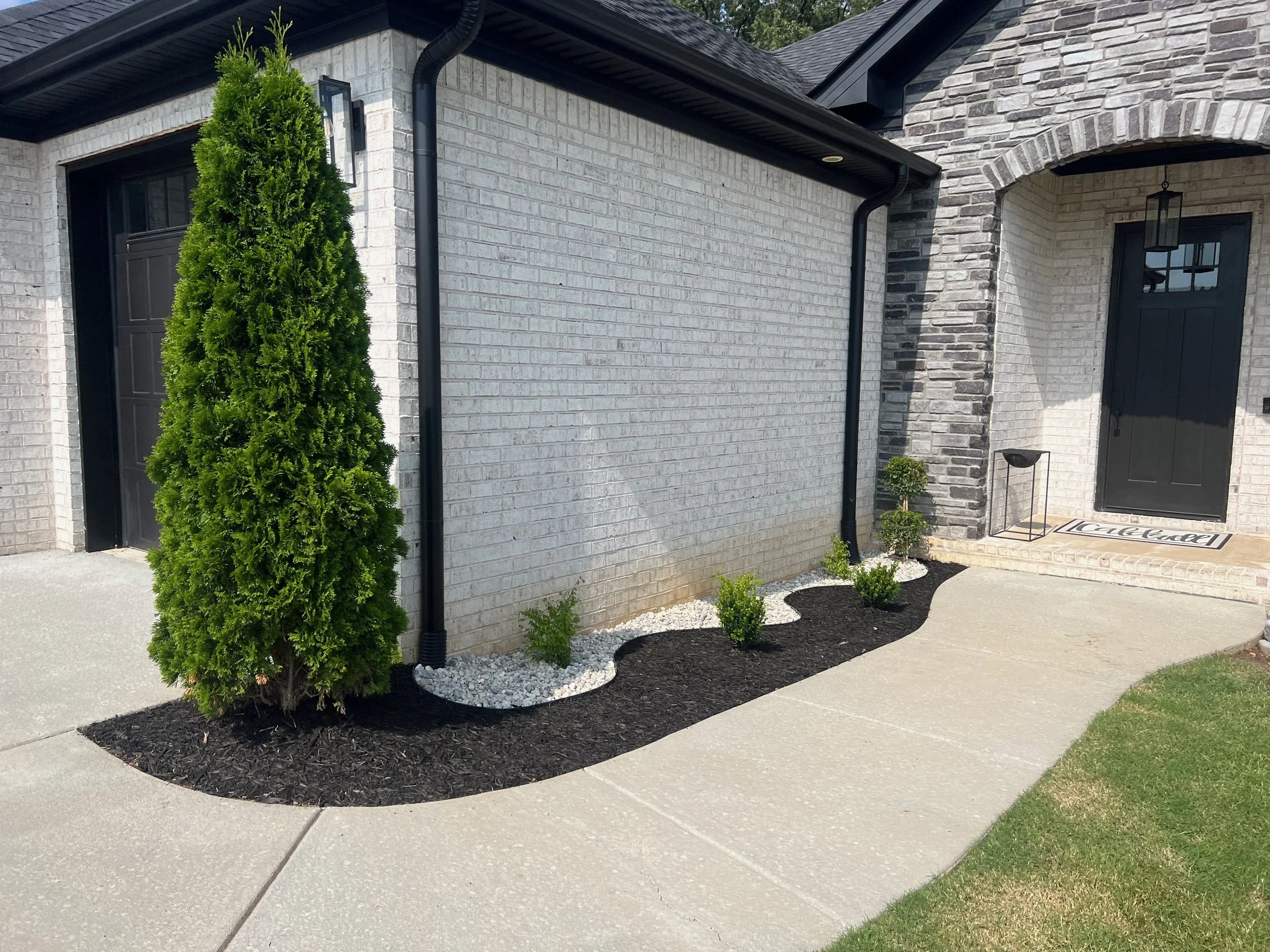 Modern Black Mulch White Rock Landscape