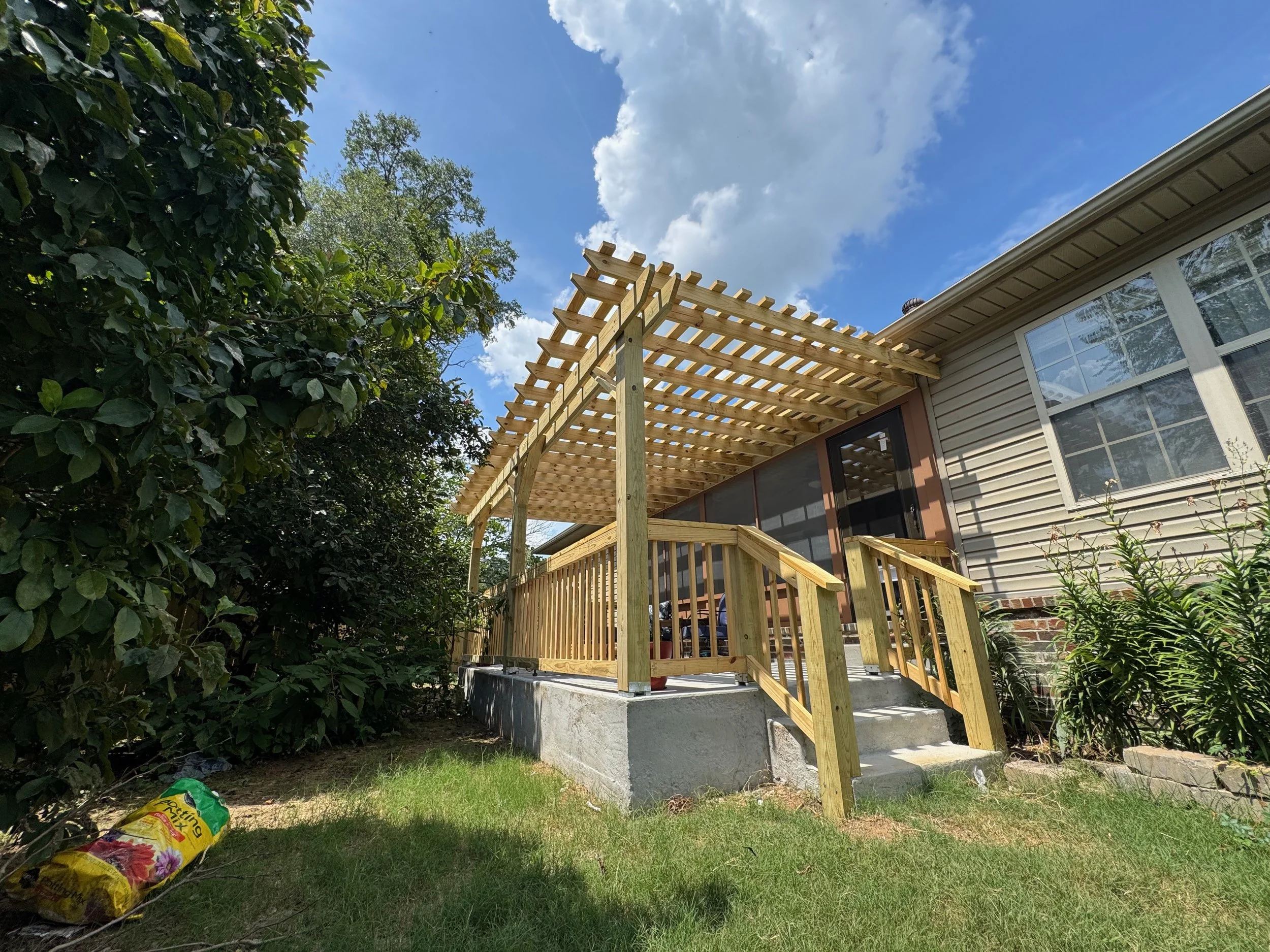 Concrete Patio Pour: With Pergola, Handrails, and Screened In Patio