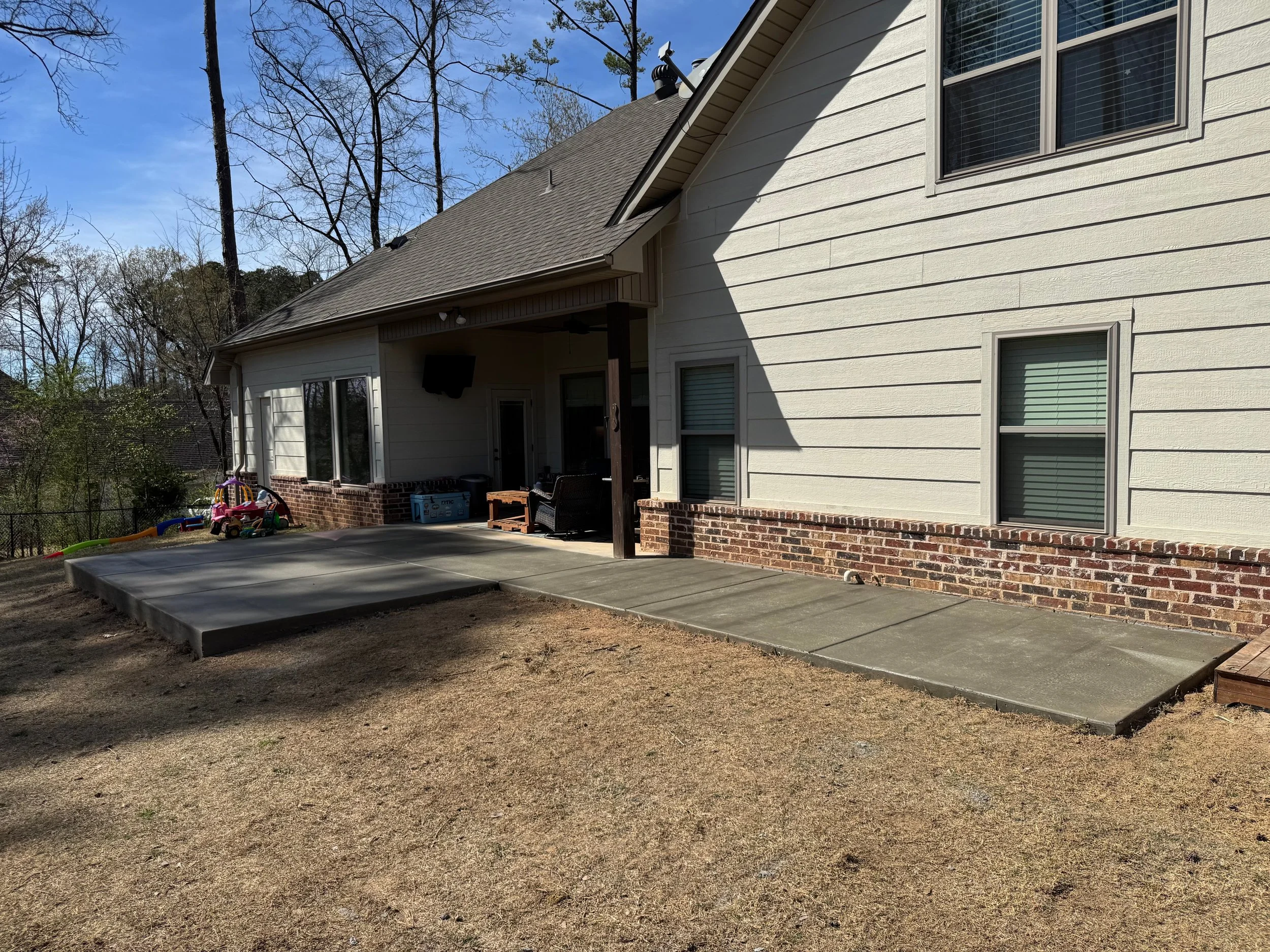Concrete Patio Extension With Grill Area