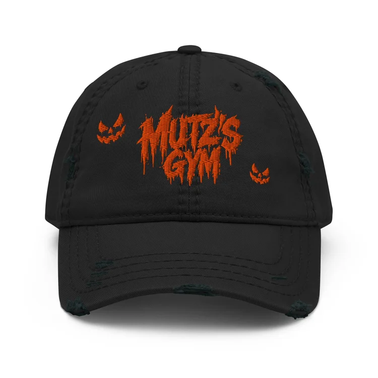 Front of Mutz's Halloween Dad Hat in black with orange Halloween Mutz’s Gym artwork