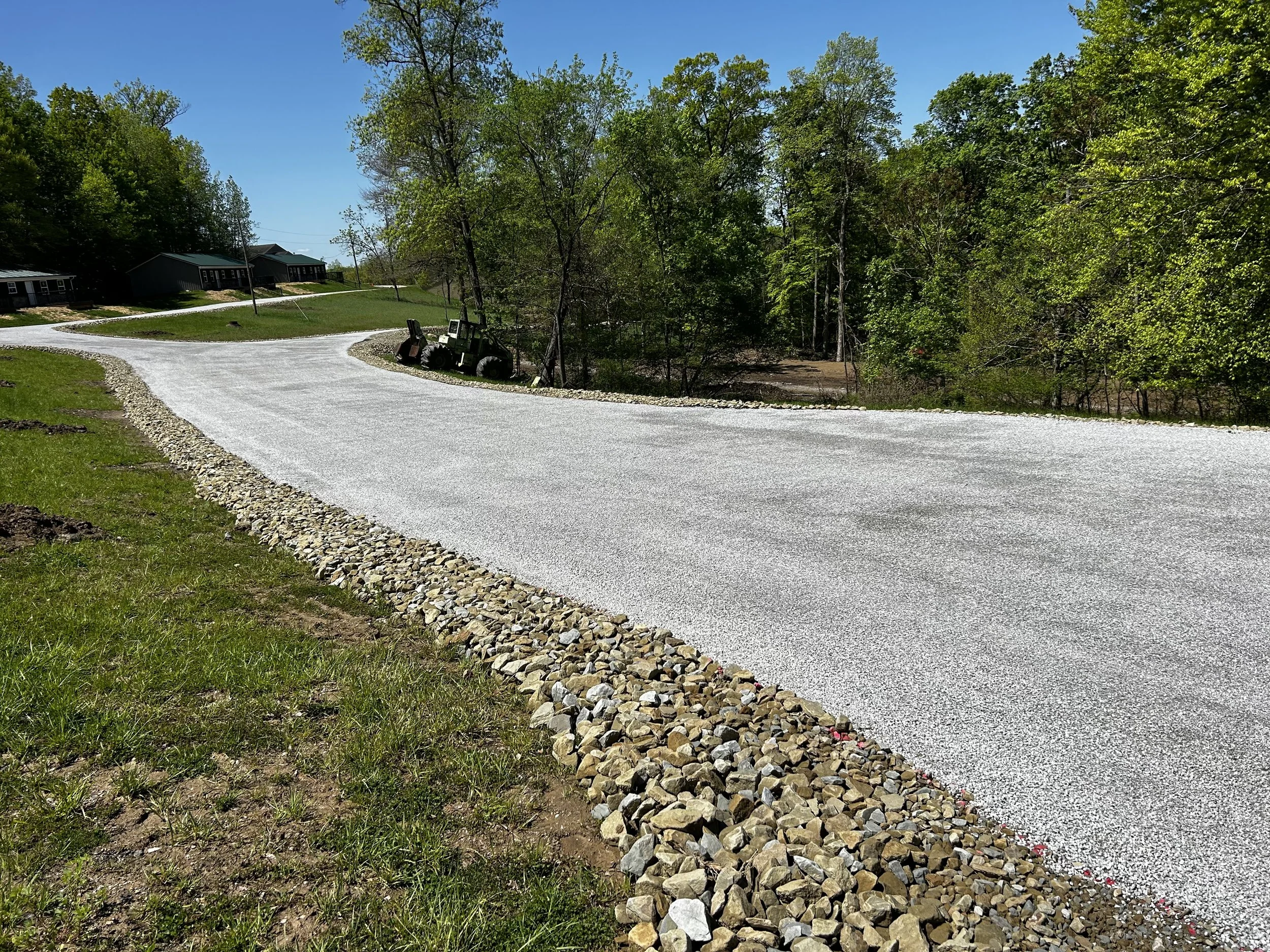 TAR AND CHIP ROCK WALL