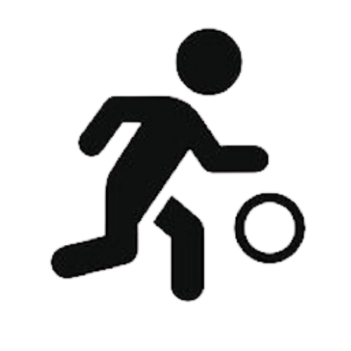 Silhouette of a person playing soccer, kicking a ball.