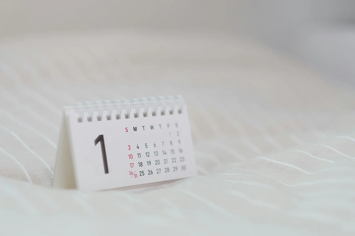 small desk calendar on white background