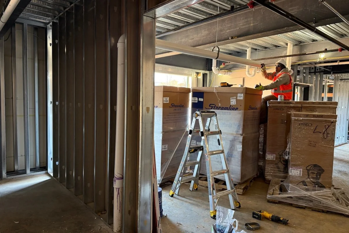 professional installing radon mitigation system