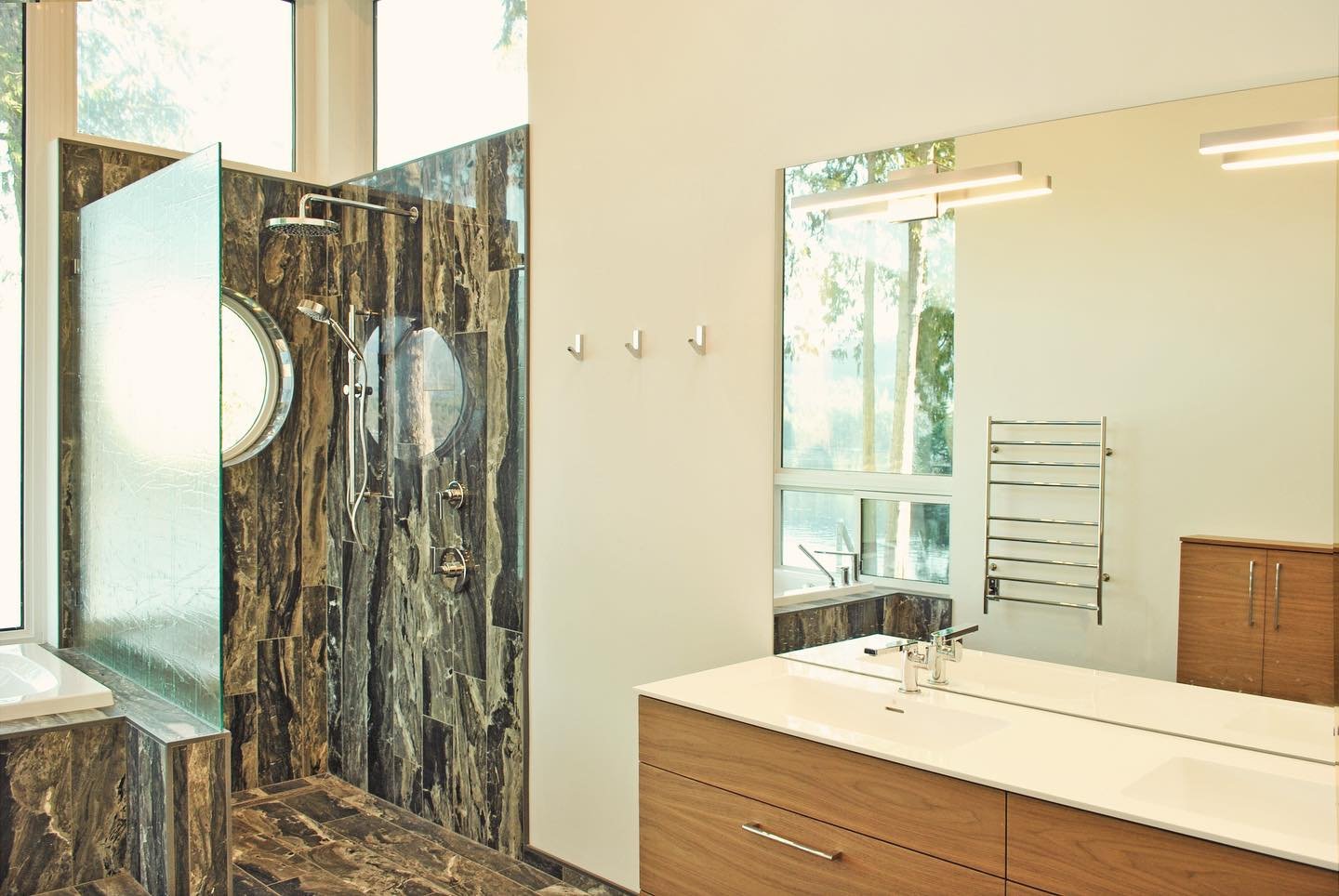 This spectacular Ensuite has ocean views from the tub and shower, high ceilings, natural light and beautiful design elements to compliment the surrounding natural landscape. I LOVED working on this project and co-designing this space with Emitini Des