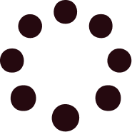 Une image avec un cercle de points rose foncé sur fond noir, représentant un chargement ou une pause.