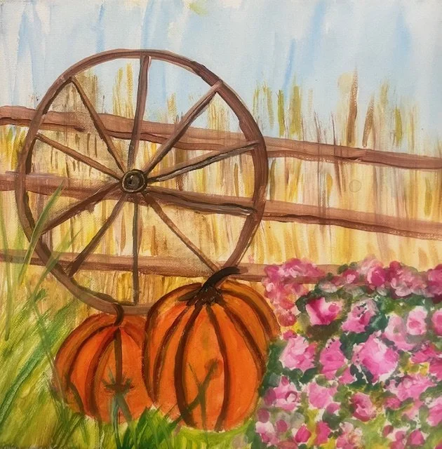 wheel fence pumpkns.jpeg