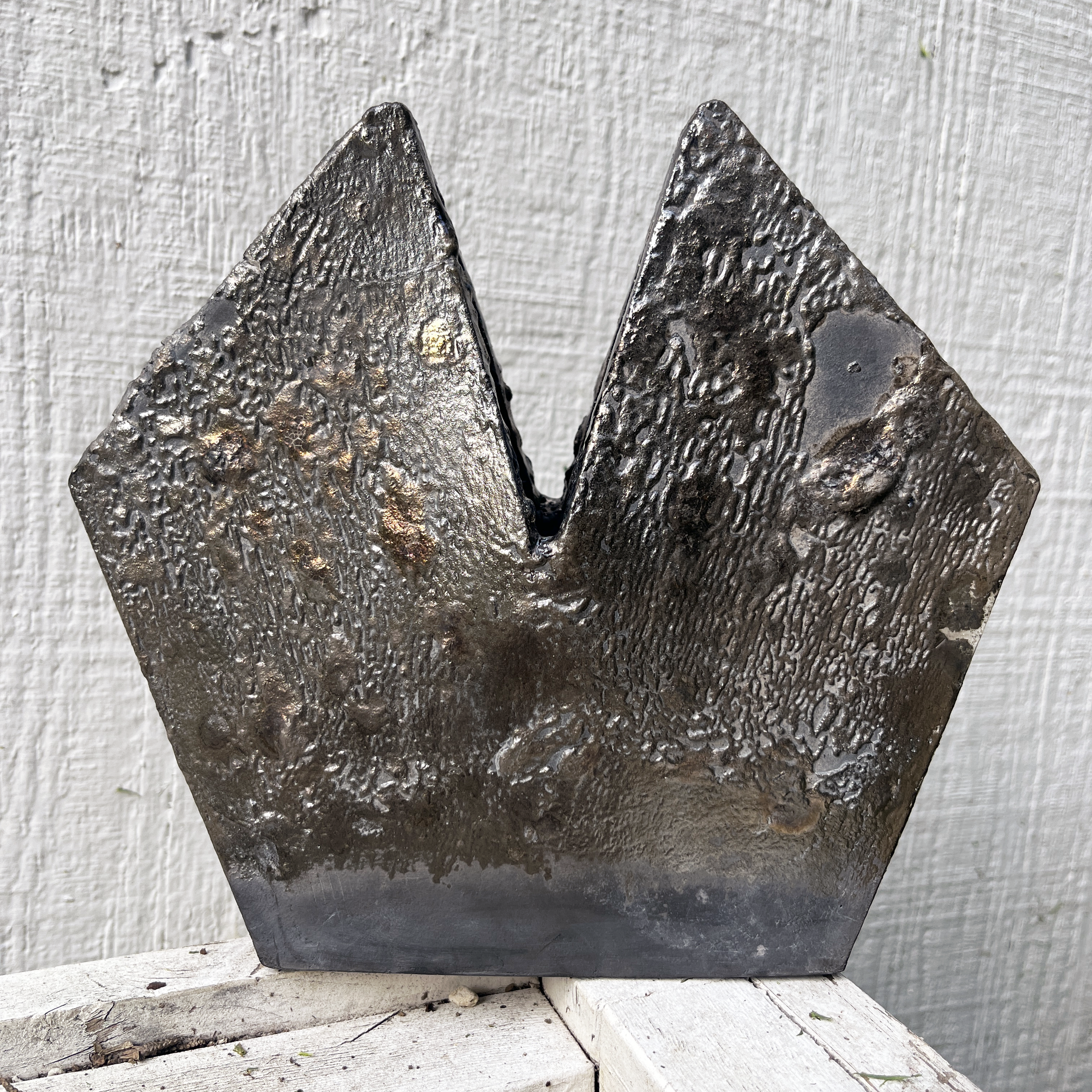 7-sided raku piece. Rusty Nail raku glaze on Soldate 60. 2026.