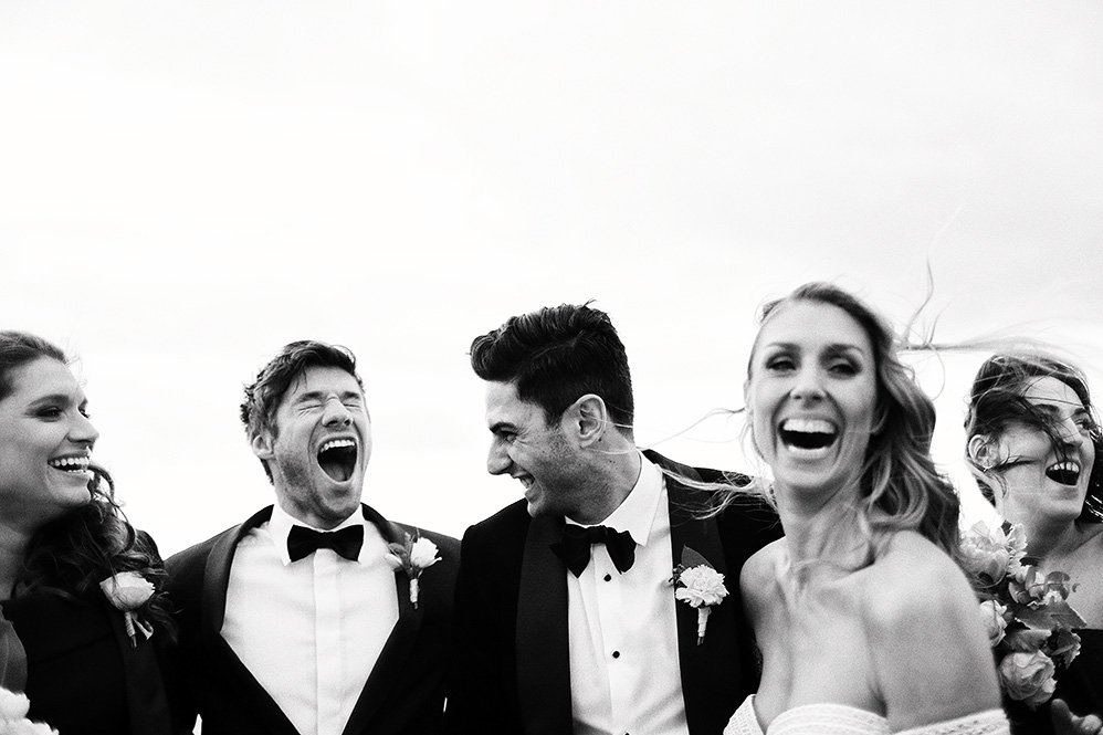 bridal party smiling and having fun