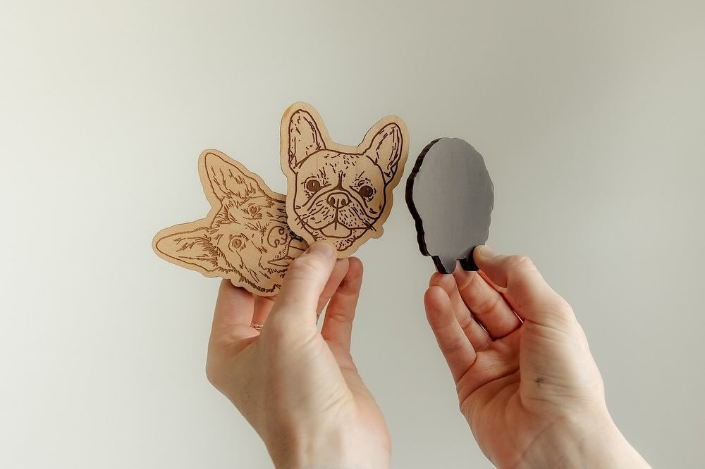 Our custom hand-drawn, laser-engraved pet portraits are now available on hardwood magnets and ornaments! 🐾 

How it works:
1. Visit saintandcompany.com
2. Add to cart + upload a photo of your pet
3. We hand-draw and laser-engrave the portrait of you