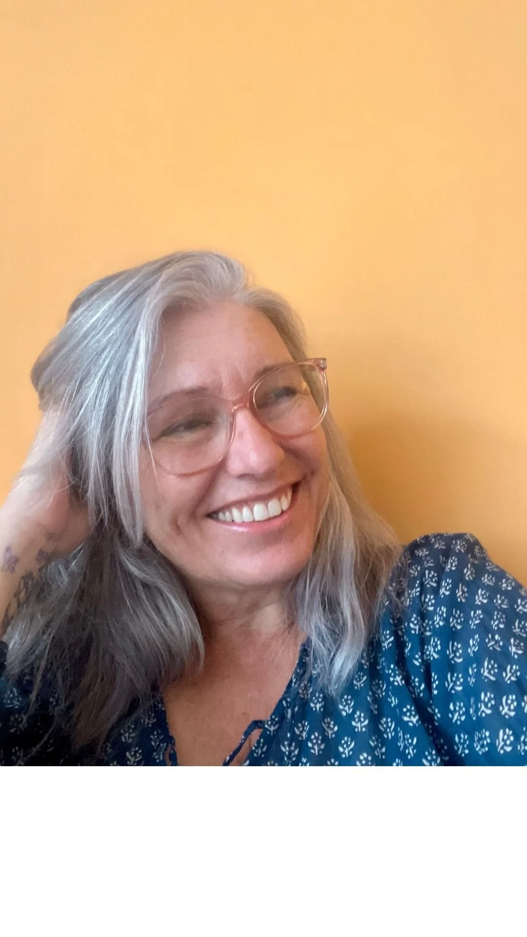 Lucia silver hair smile relaxed
