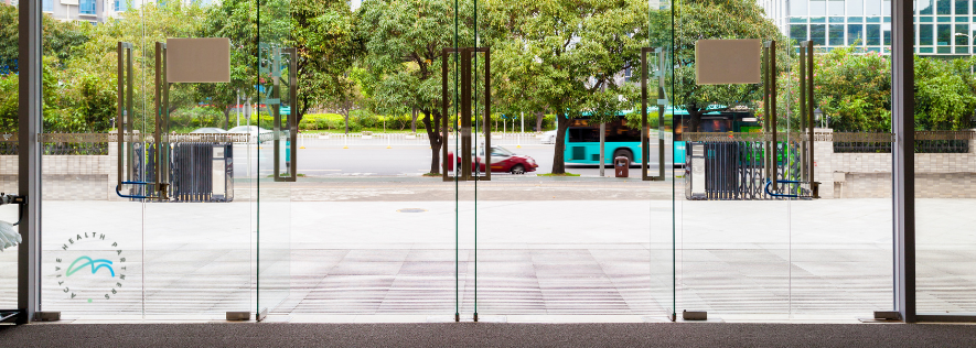 Active Health Partners workplace health and safety image showing a modern office entrance and professional business environment.