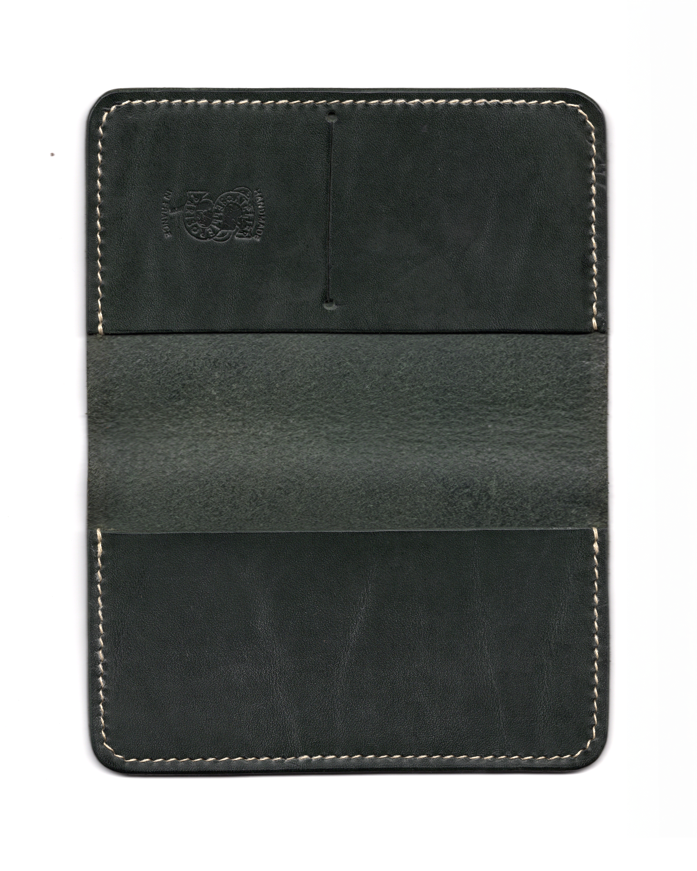 Notebook Cover — Saddle-Stitched Construction
A hand-stitched leather notebook cover developed using traditional saddle-stitch technique, emphasizing structural balance and edge refinement.