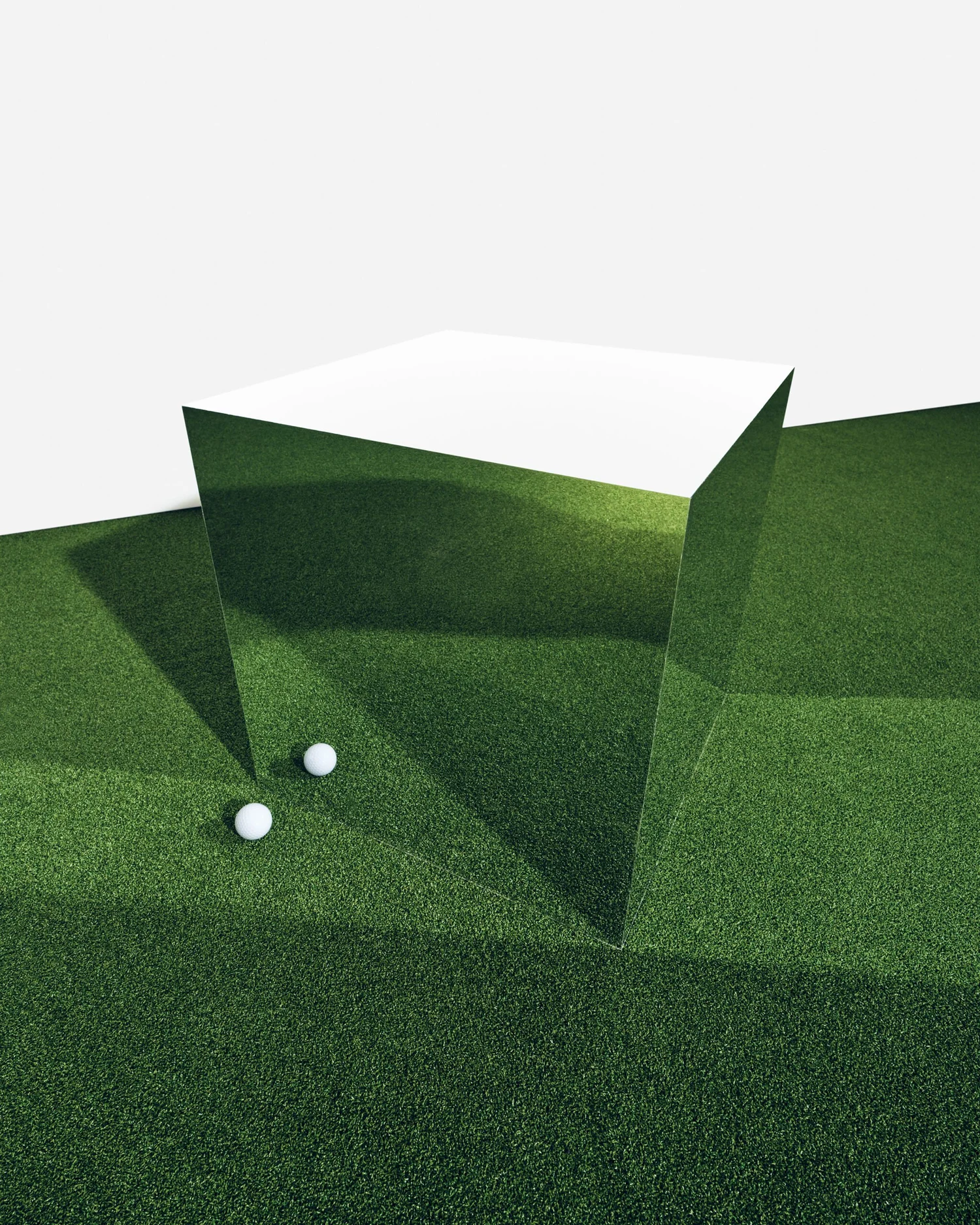 A minimalist art scene featuring a transparent rectangular block on green textured surface with two small white spheres nearby.