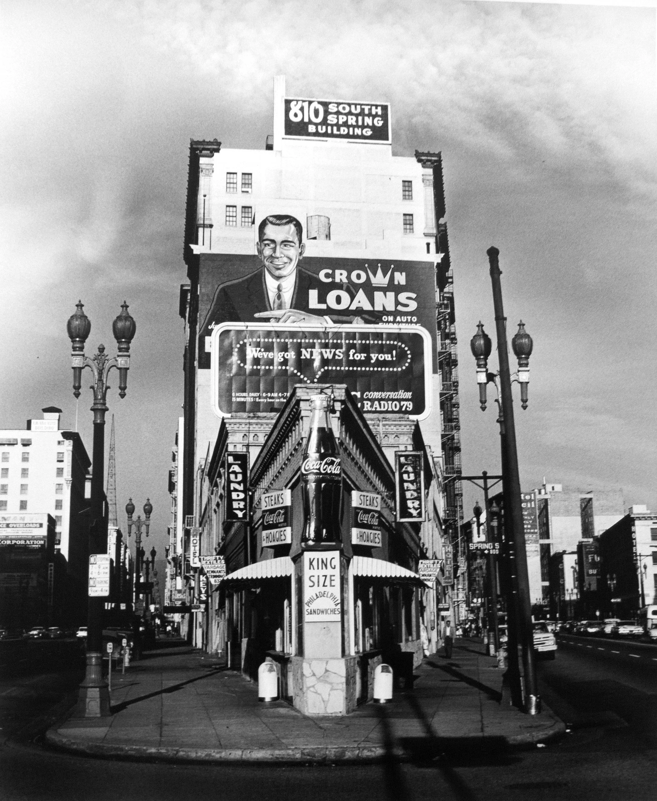   810 S. Spring Street, Los Angeles, CA , c. 1966. Silver gelatin print. Number 4 from a limited edition of 5. Printed under the direct supervision of the artist in 2008. Signed, captioned and editioned by the artist in pencil on verso. 20 x 16 inche