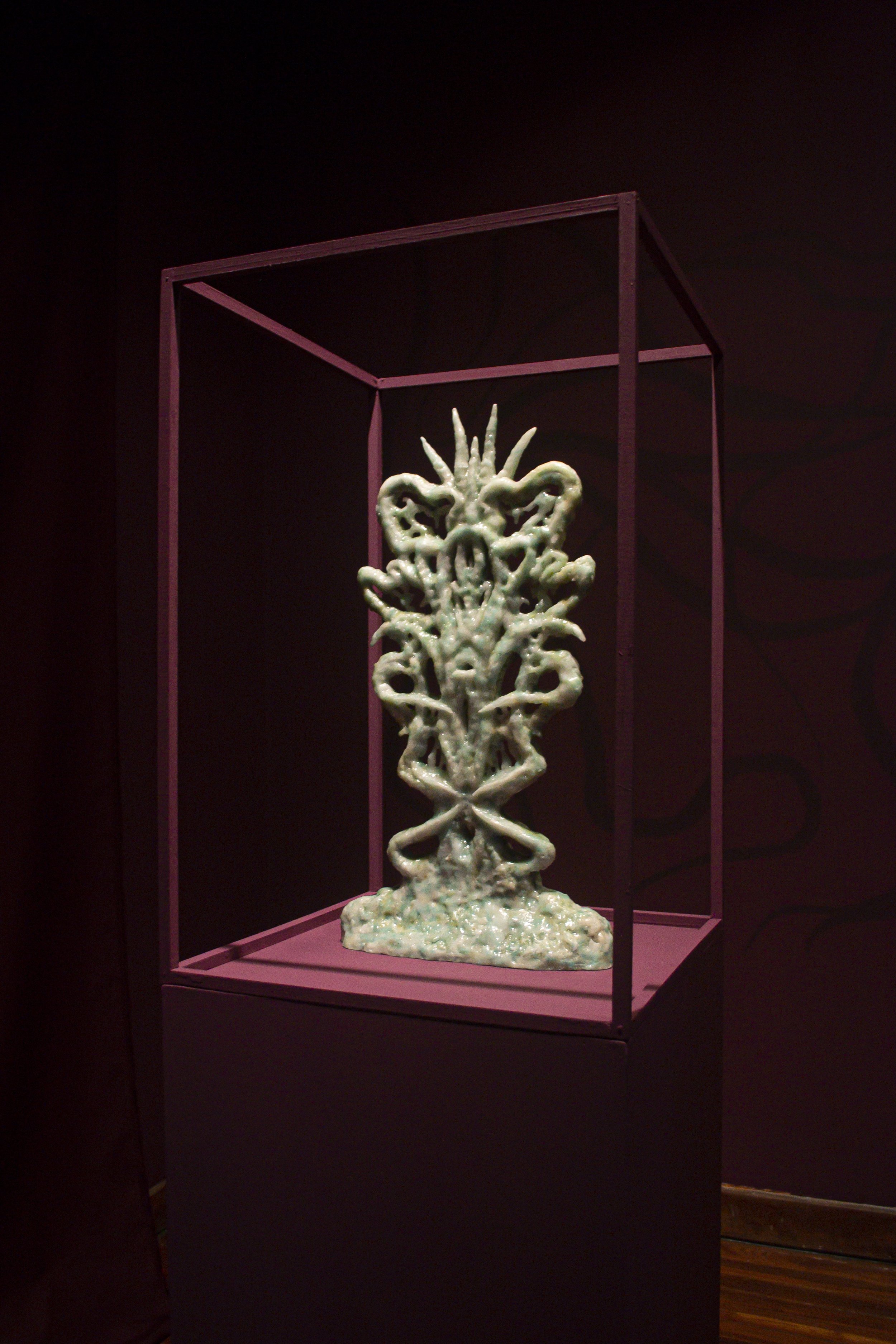   Sacred Growth,  2025 ;  Wax, pine resin, oil, polyester resin, modeling paste, varnish, 21 × 11 × 4 inches  