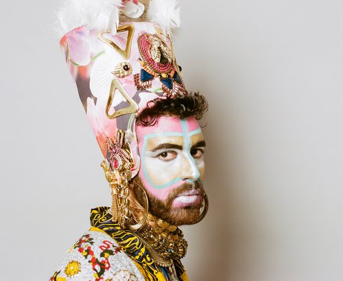 Portait of artist Dino Urpí with face paint on
