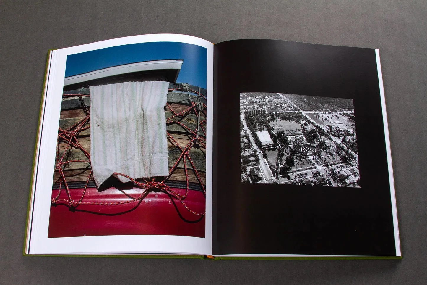 Image of an open book with two full page photographs by William Camargo