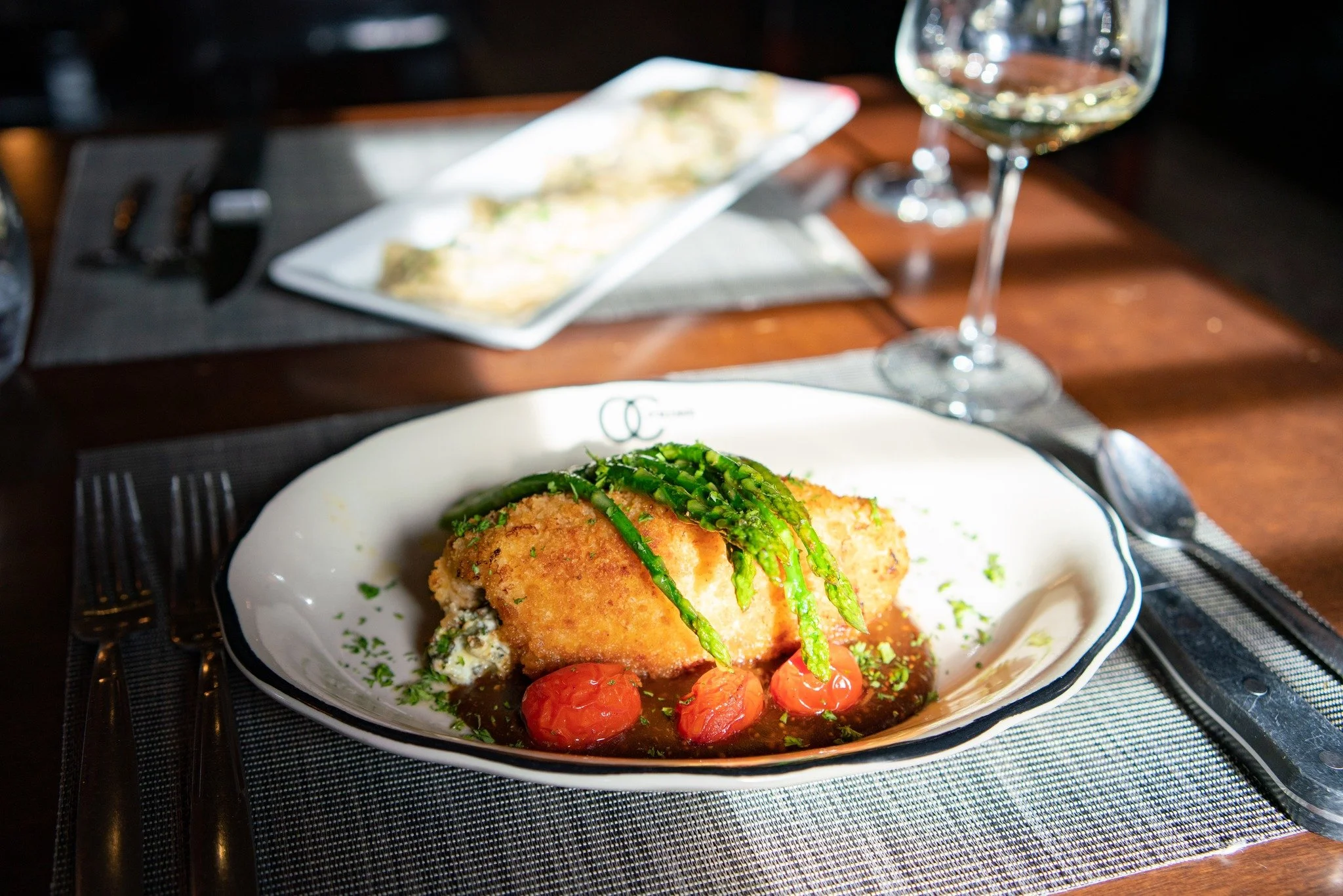 Entr&eacute;e Spotlight ✨
Indulge in our Stuffed Organic Chicken Breast Dijon &mdash; bursting with flavor from artichoke hearts, fresh spinach, cream cheese, and a golden panko crust. Finished with a silky dijon demi, roasted cherry tomatoes, and pa