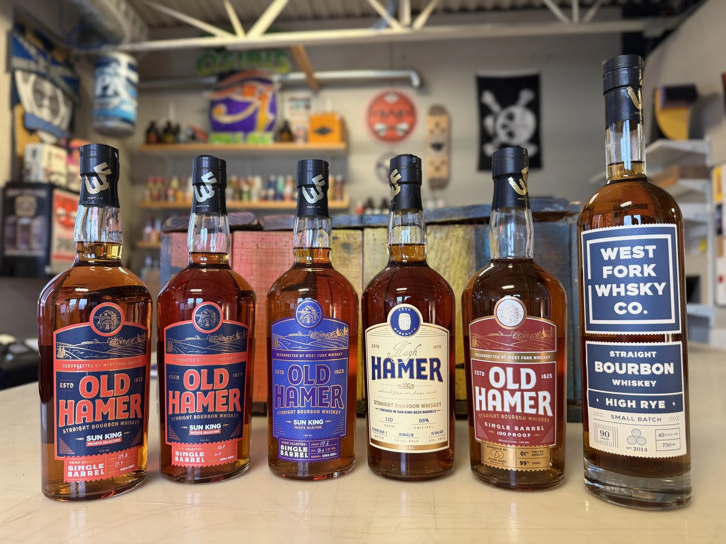 5 bottle of Sun King private label Old Hamer bourbon and 1 bottle of West Fork whiskey